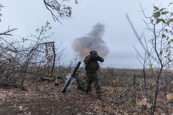 Do<em></em>nETSK OBLAST, UKRAINE - NOVEMBER 07: A Ukrainian soldier covers his ears during the mortar fire in the direction of Pokrovsk, Do<em></em>netsk Oblast, Ukraine on November 07, 2024. Photojournalist:Diego Herrera Carcedo