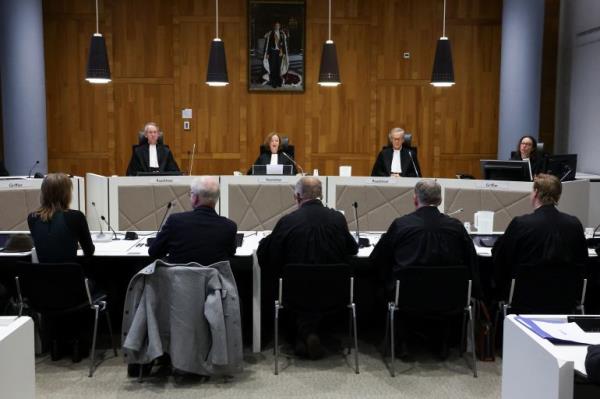 NCC Court of Appeal Judge Carla Joustra attends proceedings as a Dutch court rules in Shell's appeal over a 2021 court order to drastically deepen planned greenhouse gas emission cuts, in The Hague, Netherlands