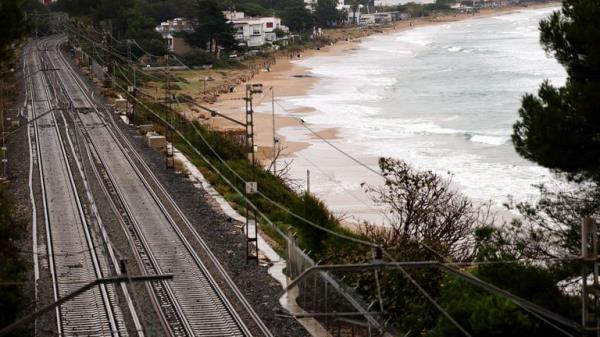 Empty train tracks and a beach, as Spain braces for a new DANA storm system, near Tarragona.
Pic: Reuters