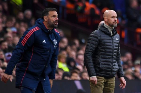 Manchester United's head coach Erik ten Hag, right, and Manchester United's assistant manager Ruud van Nistelrooy react during the English Premier League soccer match between Aston Villa and Manchester United, at Villa Park in Birmingham, England, Sunday, Oct. 6, 2024. (AP Photo/Rui Vieira)