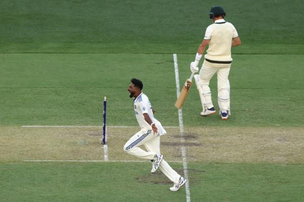 PERTH, AUSTRALIA - NOVEMBER 22: Mohammed Siraj of India celebrates taking the wicket of Marnus Labuschagne of Australia for 2 runsduring day one of the First Test match in the series between Australia and India at Perth Stadium on November 22, 2024 in Perth, Australia. (Photo by Robert Cianflone/Getty Images)