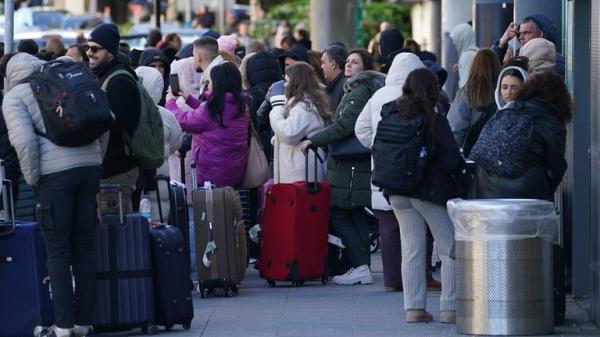 Passengers at Gatwick Airport after flights were cancelled. Pic: PA