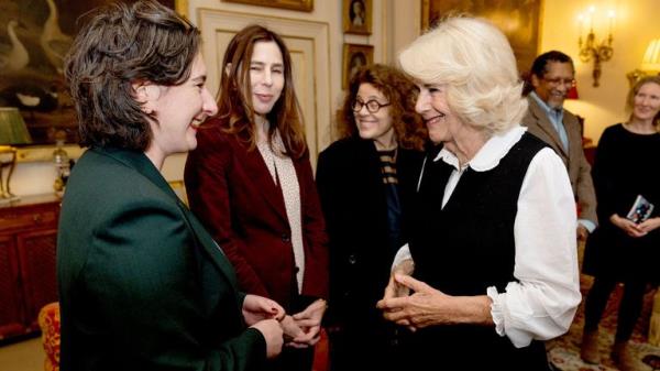 Queen Camilla talks with Yael van der Wouden, during a reception for the Booker Prize Foundation at Clarence House, London. Picture date: Tuesday November 12, 2024. PA Photo. See PA story ROYAL Queen. Photo credit should read: Aaron Chown/PA Wire