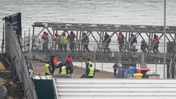 A group of people thought to be migrants are brought in to Dover, Kent, from a Border Force vessel following a small boat incident in the Channel. Picture date: Thursday December 12, 2024.

