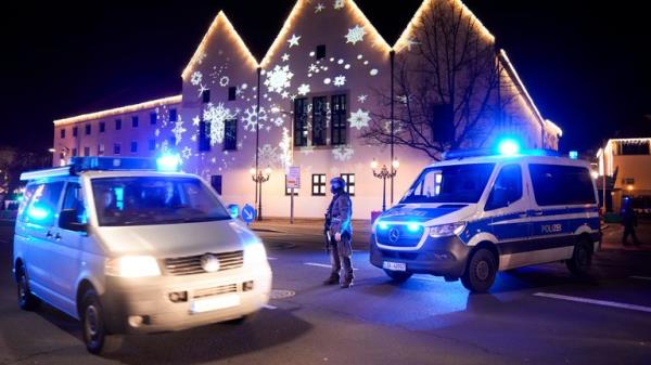 A police officer guards a blocked road near the Christmas market in Magdeburg. Pic: AP