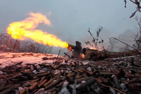 In this photo taken from a video released by Russian Defense Ministry press service on Monday, Dec. 23, 2024, a Russian serviceman fires a 9M113 Ko<em></em>nkurs wire-guided anti-tank missile at an undisclosed location. (Russian Defense Ministry Press Service via AP)