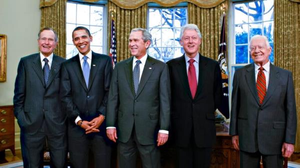 FILE ... From left, former President George H.W. Bush, President-elect Barack Obama, President George W. Bush, former President Bill Clinton and former President Jimmy Carter, meet in the Oval Office at the White House in Washington, Wednesday, Jan. 7, 2009. (AP Photo/J. Scott Applewhite, File)