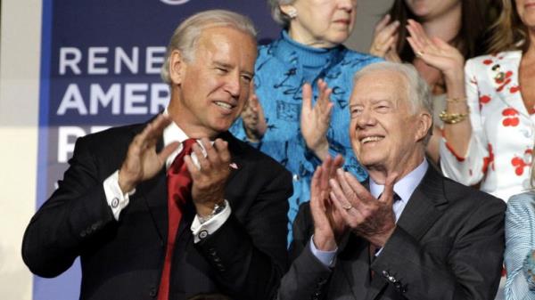 FILE - Sen. Joe Biden and former President Jimmy Carter are seen at the Democratic Natio<em></em>nal Co<em></em>nvention in Denver, Aug. 26, 2008. (AP Photo/Paul Sancya, File)


