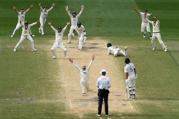 MELBOURNE, AUSTRALIA - DECEMBER 30: Nathan Lyon celebrates after trapping Mohammed Siraj lbw as Australia won the match during day five of the Men's Fourth Test Match in the series between Australia and India at Melbourne Cricket Ground on December 30, 2024 in Melbourne, Australia. (Photo by Quinn Rooney/Getty Images)