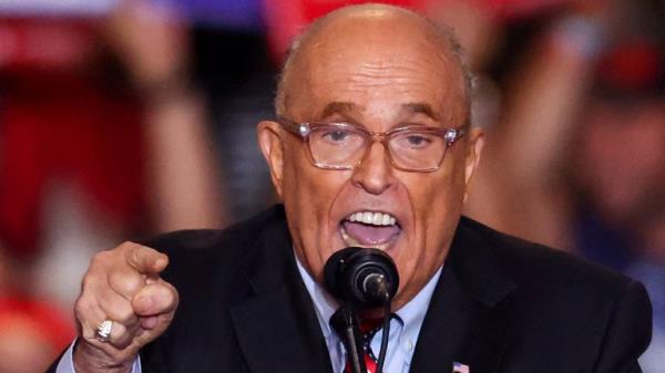 FILE PHOTO: Former mayor of New York City and former Trump lawyer Rudy Giuliani speaks at the Nassau Veterans Memorial Coliseum during a rally held by Republican presidential nominees and former U.S. President Do<em></em>nald Trump, in Unio<em></em>ndale, New York, U.S., September 18, 2024. REUTERS/Brendan McDermid/File Photo