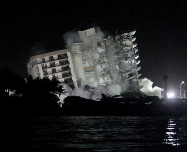 The remaining part of the partially collapsed 12-story Champlain Towers South co<em></em>ndo building fell in a co<em></em>ntrolled demolition on July 4, 2021 in Surfside, Florida