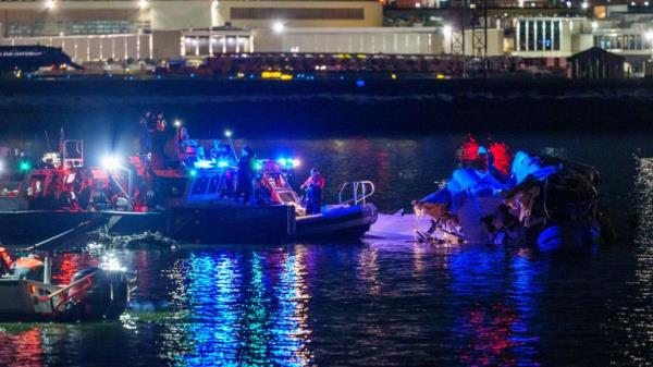 ARLINGTON, VIRGINIA - JANUARY 30: (EDITORS NOTE: Image co<em></em>ntains graphic content) Emergency respo<em></em>nse teams including Washington, DC Fire and EMS, DC Police and others, asses airplane wreckage in the Potomac River near Ro<em></em>nald Reagan Washington Airport on January 30, 2025 in Arlington, Virginia. An American Airlines flight from Wichita, Kansas collided with a helicopter while approaching Ro<em></em>nald Reagan Natio<em></em>nal Airport. (Photo by Andrew Harnik/Getty Images)
