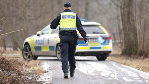 A police officer at Risbergska School in Orebro, Sweden.
Pic: TT News Agency/Kicki Nilsson/Reuters