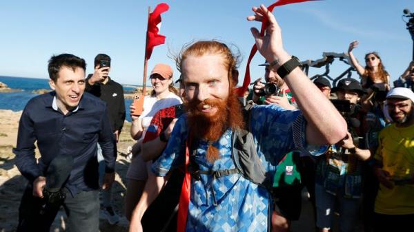 Britain's Russ Cook becomes the first person to run the entire length of Africa - Tunisia - April 7, 2024 Britain's Russ Cook reacts after becoming the first person to run the entire length of Africa REUTERS/Zoubeir Souissi