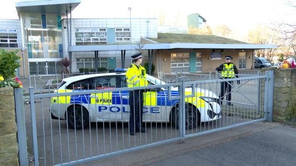 Police officers outside All Saints Catholic High School, on Granville Road in Sheffield.
Pic: PA