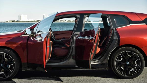 Four co<em></em>nventionally hinged doors on the new BMW iX