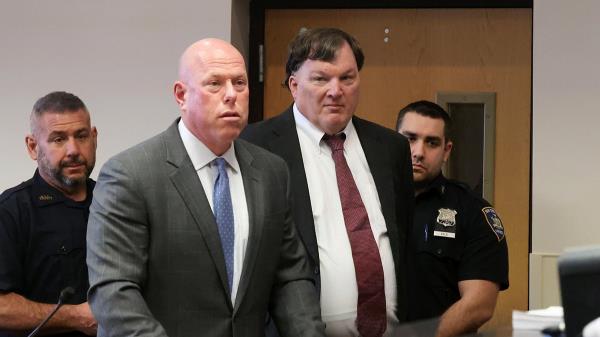 Michael Brown speaks alo<em></em>ngside Rex Heuermann in court