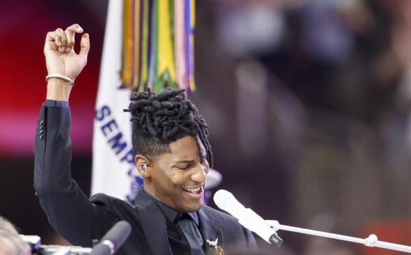 Jon Batiste sings the natio<em></em>nal anthem before the Kansas City Chiefs face the Philadelphia Eagles during Super Bowl LIX at Caesars Superdome in New Orleans on Sunday, February 9, 2025.