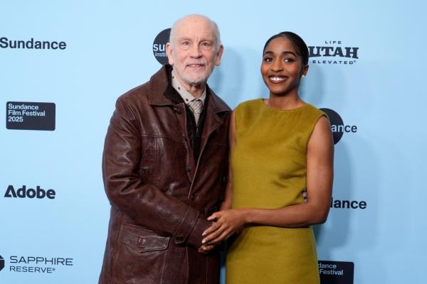 John Malkovich and Ayo Edebiri on the red carpet