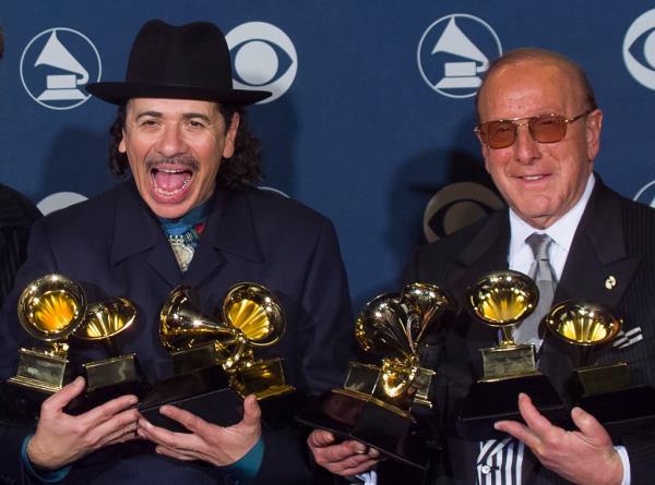 Carlos Santana and Clive Davis at the 2000 Grammys.