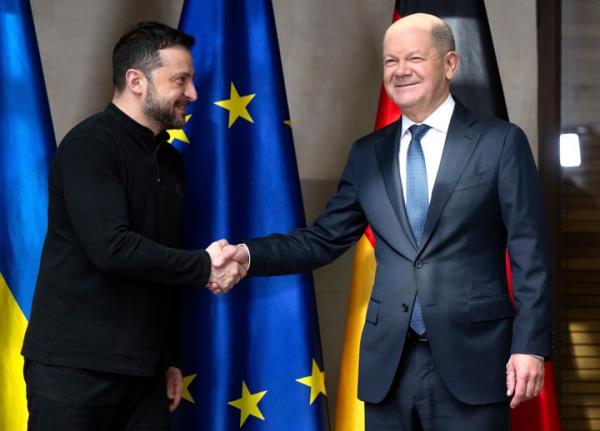 Germany's Chancellor Olaf Scholz, right and Ukraine's President Volodymyr Zelenskyy, meet for talks at the Munich Security Conference, in Munich, Germany, Saturday, Feb.15, 2025. (Sven Hoppe/DPA via AP, Pool)