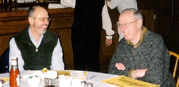 The author, left, with his father at the elder's 70th birthday celebration.