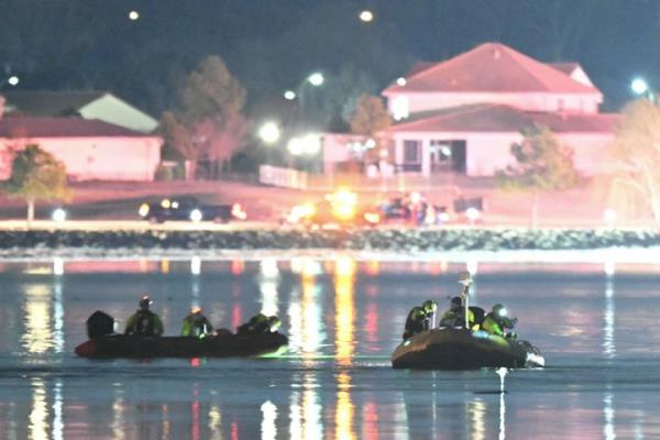 Rescue boats search the waters of the Potomac River after American Airlines flight 5342 on approach to Reagan Natio<em></em>nal Airport crashed into the river outside Washington, D.C., on Jan. 30.