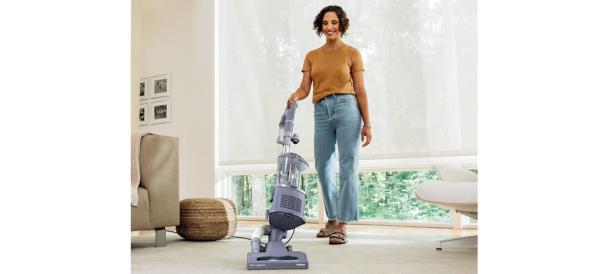 Person vacuuming with Shark Navigator Lift-Away Upright Vacuum